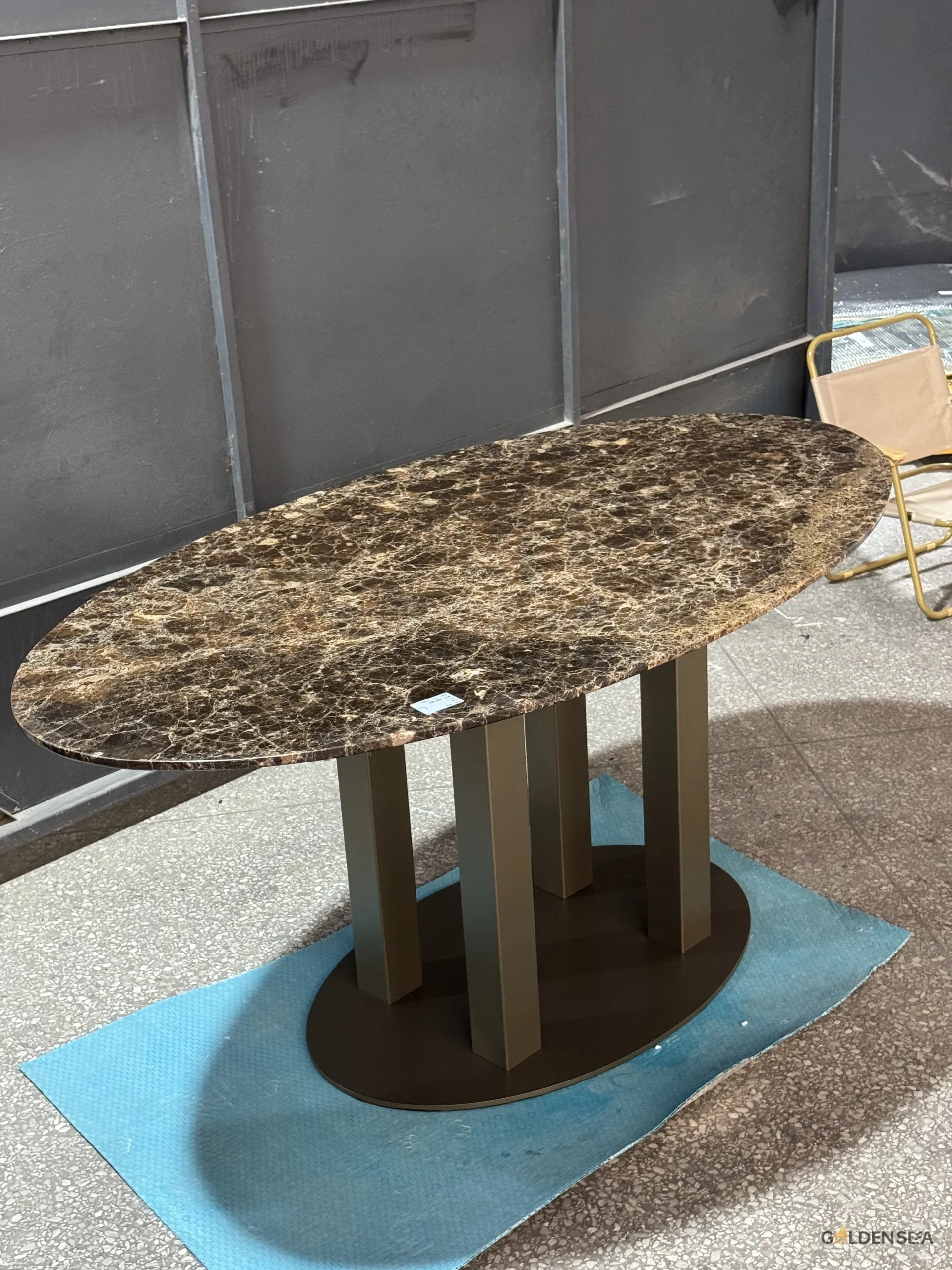 Dark Emperador marble slab with white and beige veining on polished dark brown surface Dark Emperador marble slab with white and beige veining on polished dark brown surface